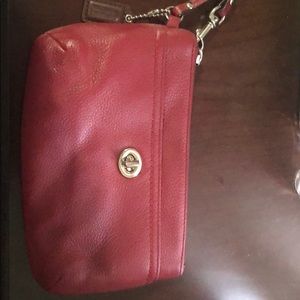 Red Coach Wristlet with front pocket design